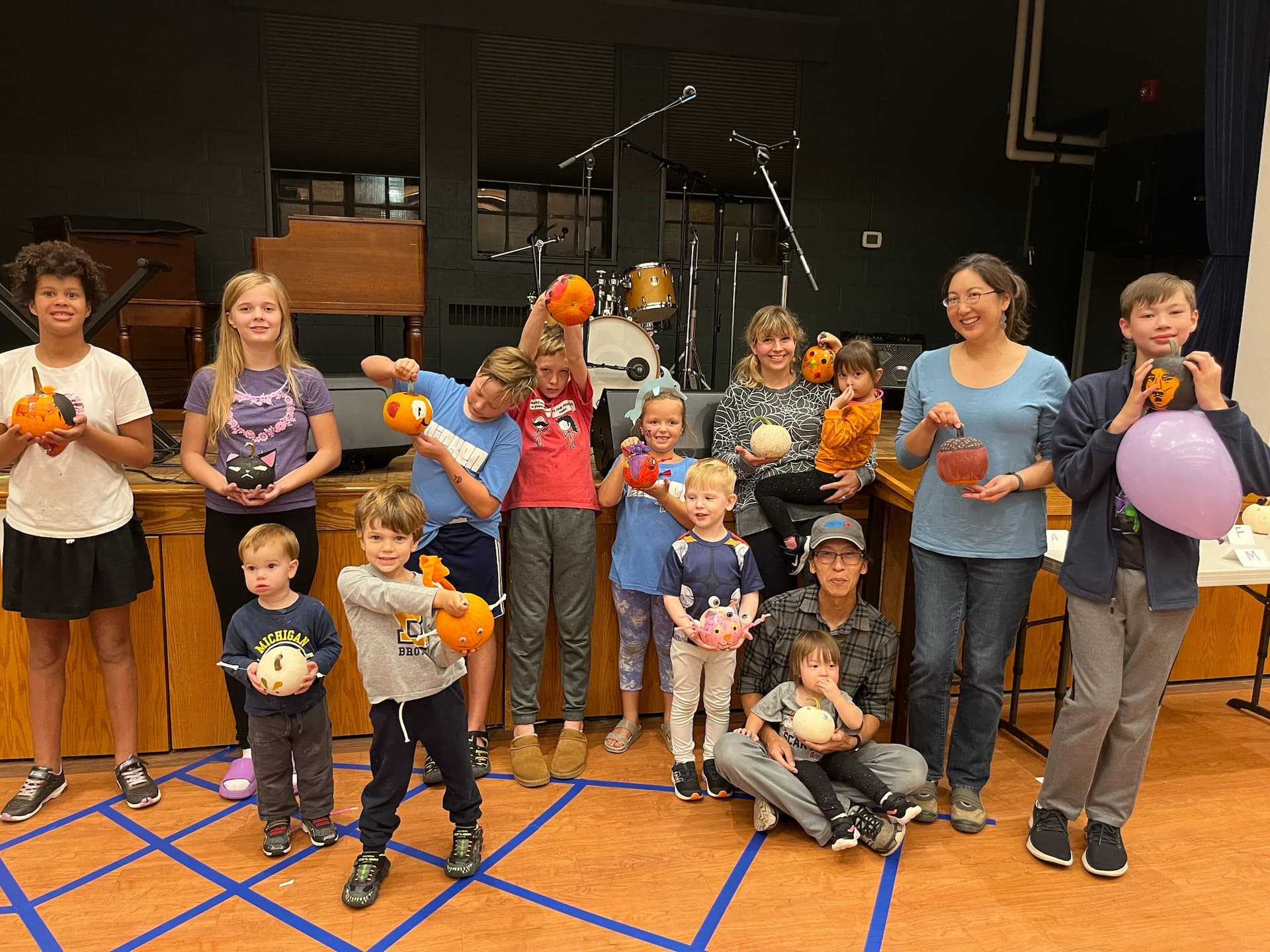 Kids painting rocks at FCC Ann Arbor